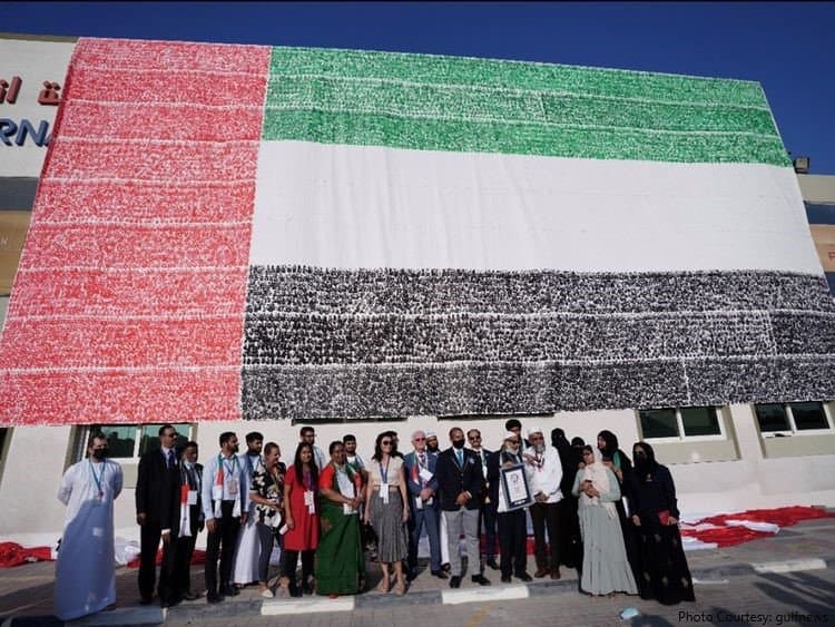 64 Nationalities' Handprints Making UAE Flag Enters Guinness Book