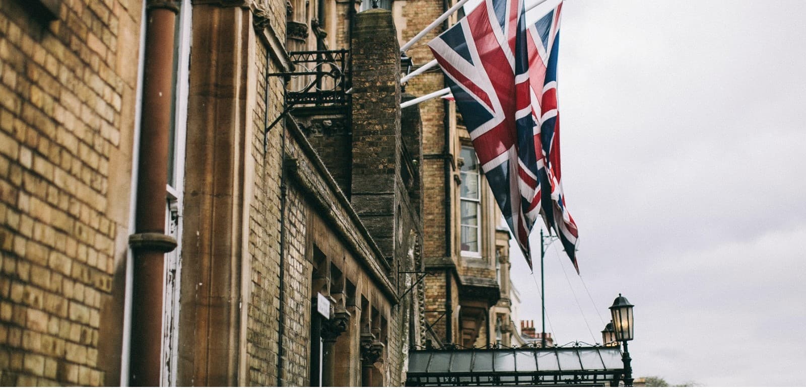What Non-British Expatriates Need to Know Before Purchasing Real Estate in the UK